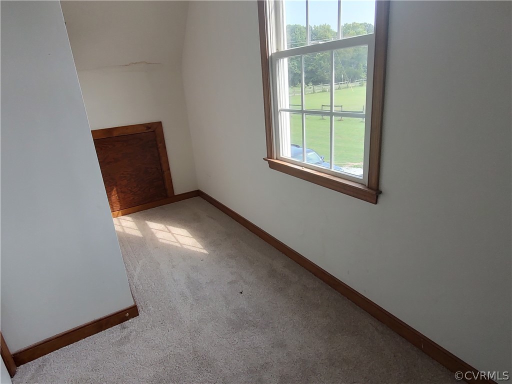 15895 Loving Union Road Disputanta, VA 23842 - Photo 40 of 42 an empty room with a window