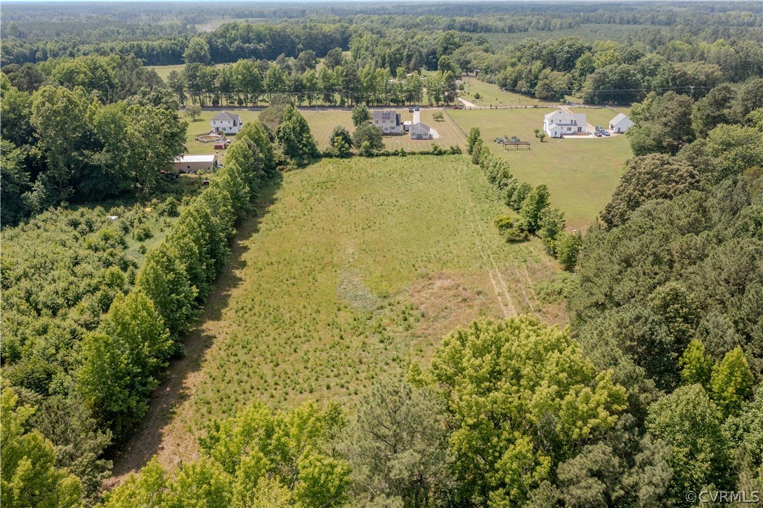 15895 Loving Union Road Disputanta, VA 23842 - Photo 5 of 42 a view of a lake with a house