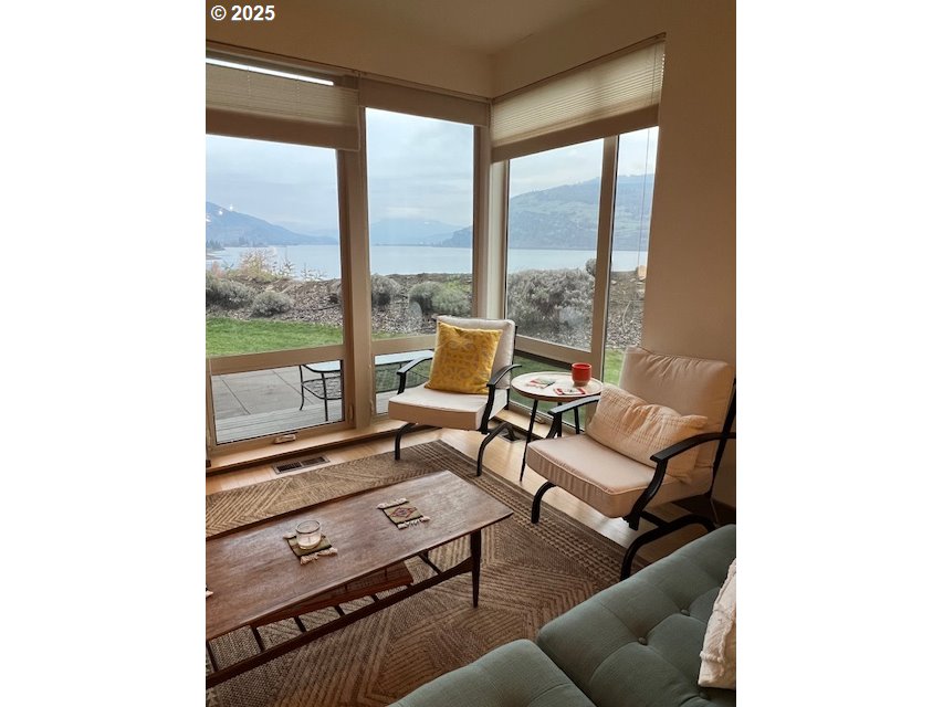 26 Mosier Creek Place, Unit 26 Mosier, OR 97040 - Photo 13 of 38 a living room with furniture and large windows