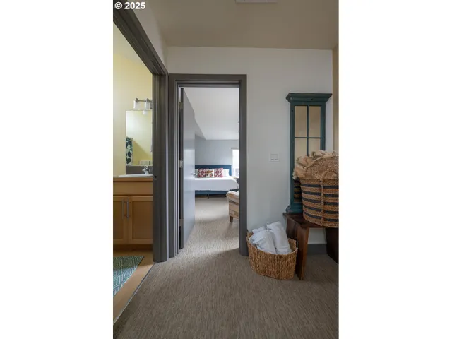 a view of a kitchen from a hallway
