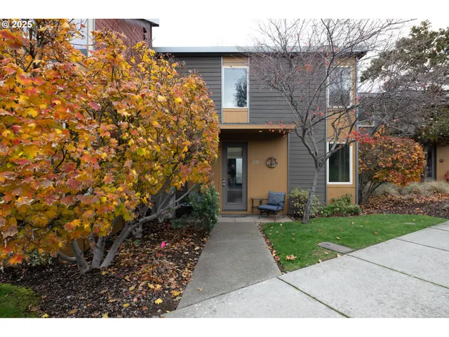 a view of a street with a building in the background