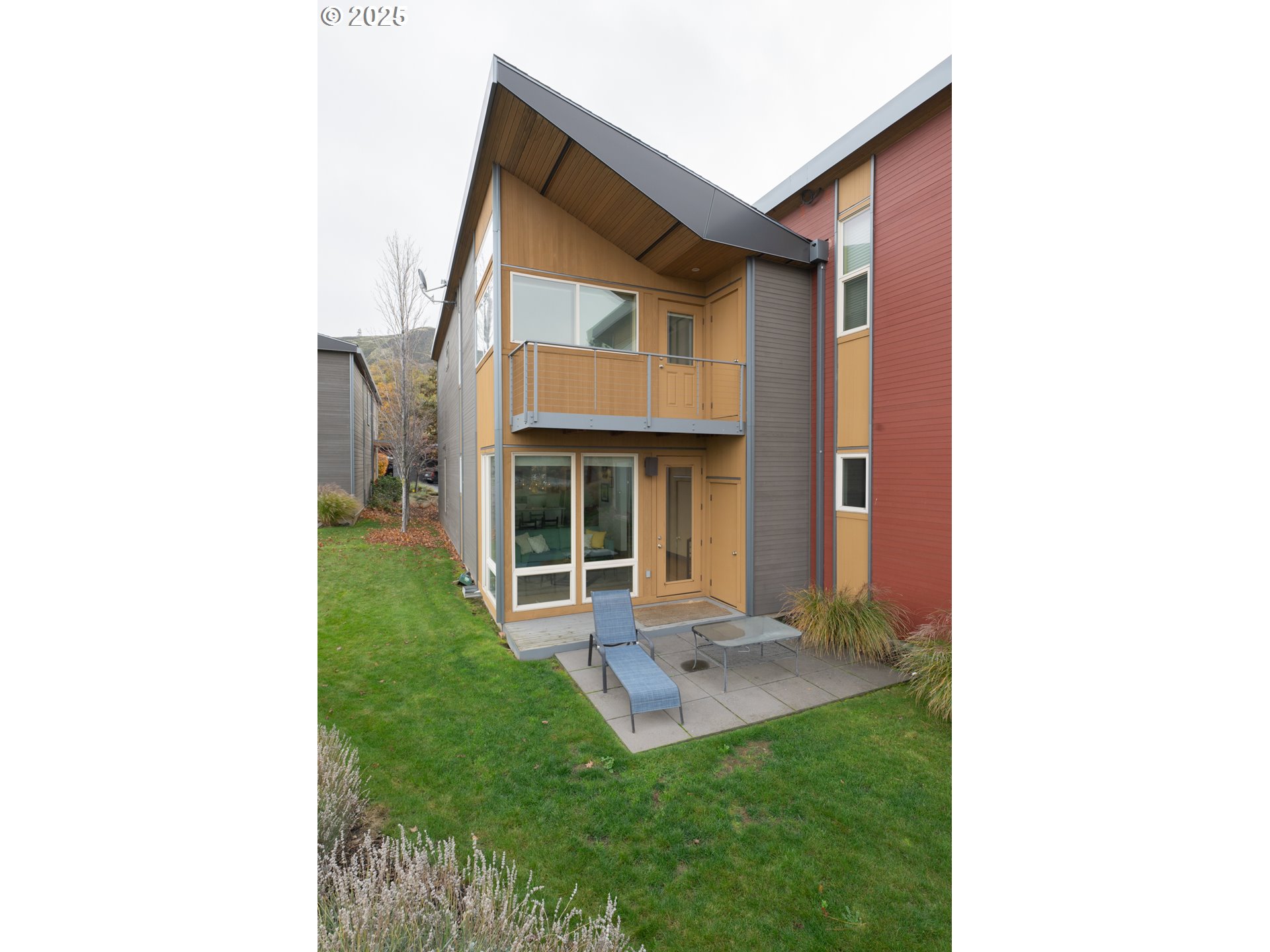26 Mosier Creek Place, Unit 26 Mosier, OR 97040 - Photo 32 of 38 a view of a house with a yard and sitting area