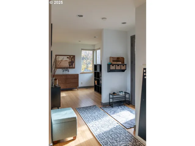 a kitchen with stainless steel appliances kitchen island granite countertop a sink and cabinets