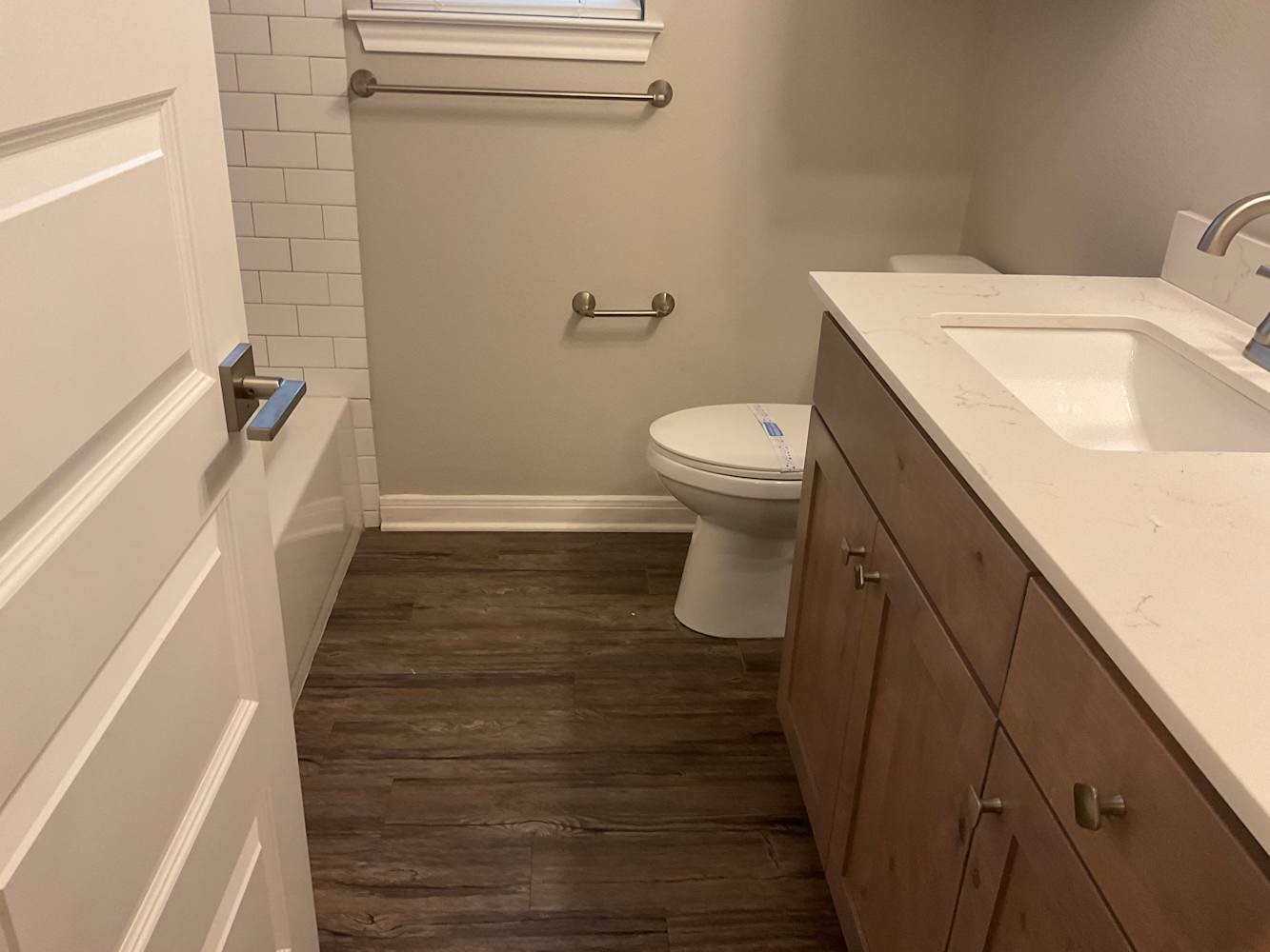 179 Holly Street Georgetown, TX 78626 - Photo 11 of 13 a bathroom with a sink and toilet