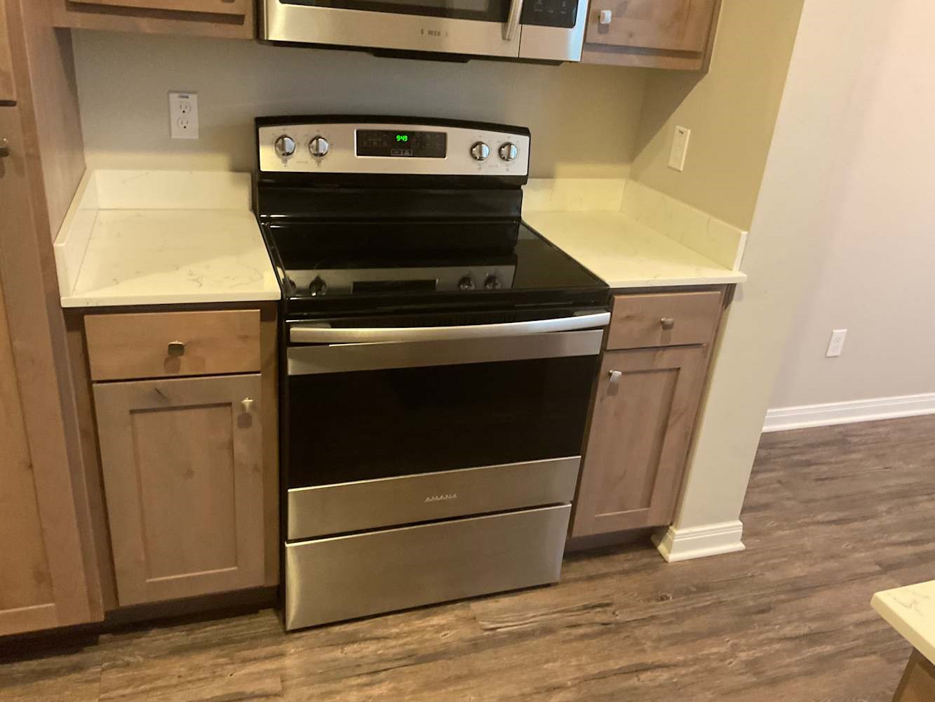 179 Holly Street Georgetown, TX 78626 - Photo 6 of 13 a stove top oven sitting inside of a kitchen