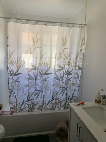 a view of a room with a table and chair