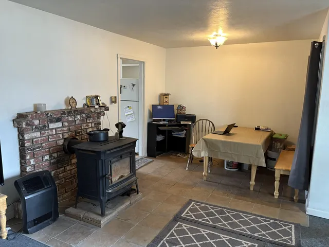 a view of a workspace with furniture