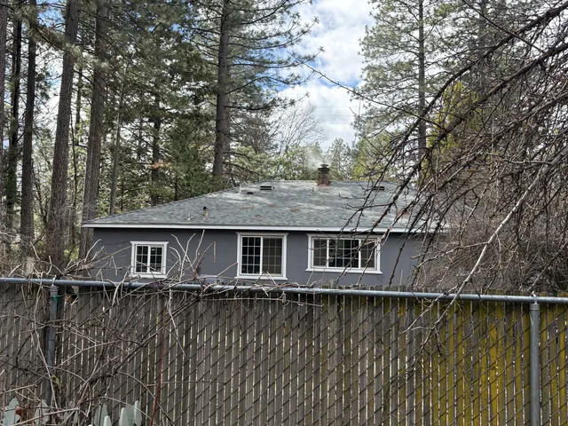 front view of a house with a lake view
