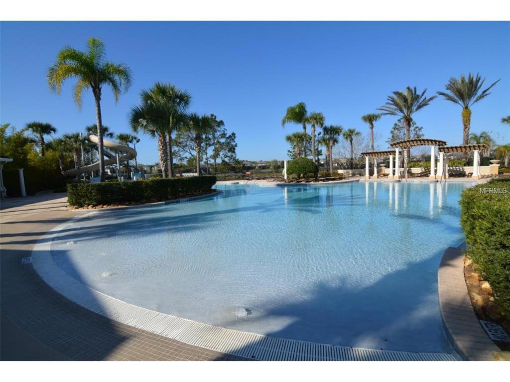 2817 Almaton Loop, Unit 304 Kissimmee, FL 34747 - Photo 18 of 26 a view of a swimming pool and a chair