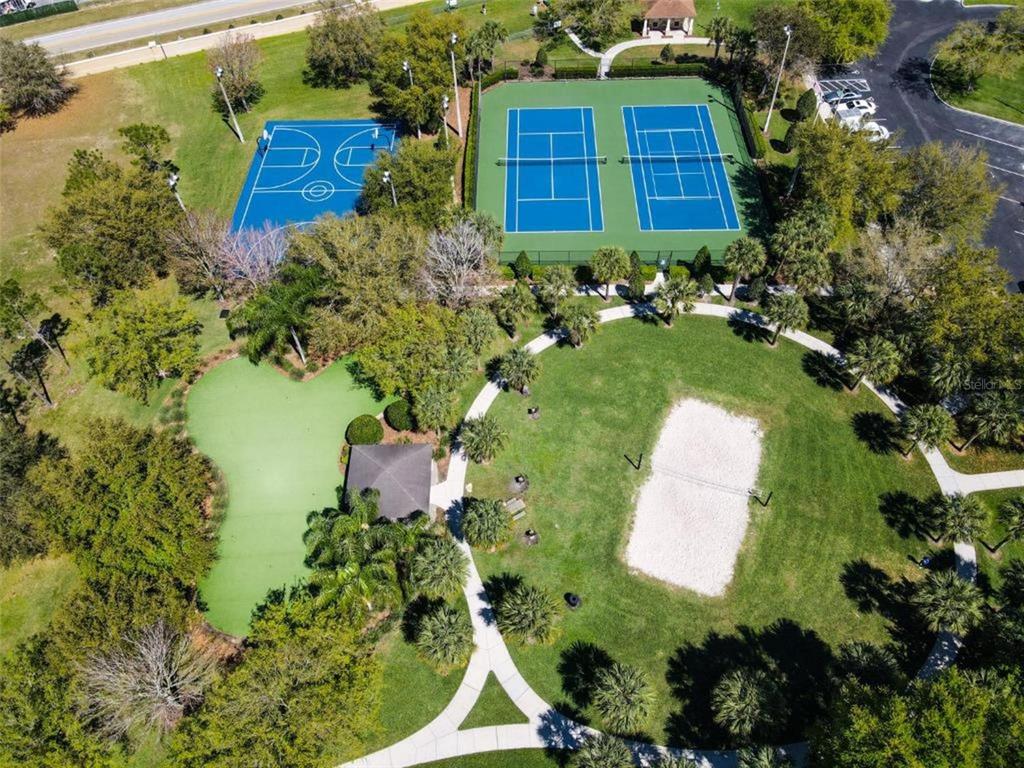 2817 Almaton Loop, Unit 304 Kissimmee, FL 34747 - Photo 24 of 26 a view of a house with a yard