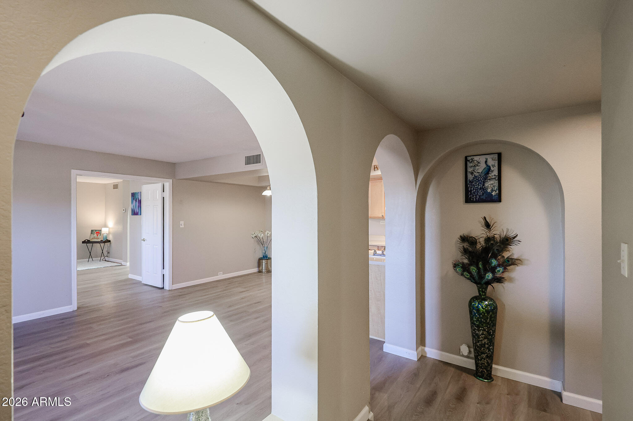 10410 North Cave Creek Road, Unit 1011 Phoenix, AZ 85020 - Photo 2 of 54 a view of livingroom with wooden floor