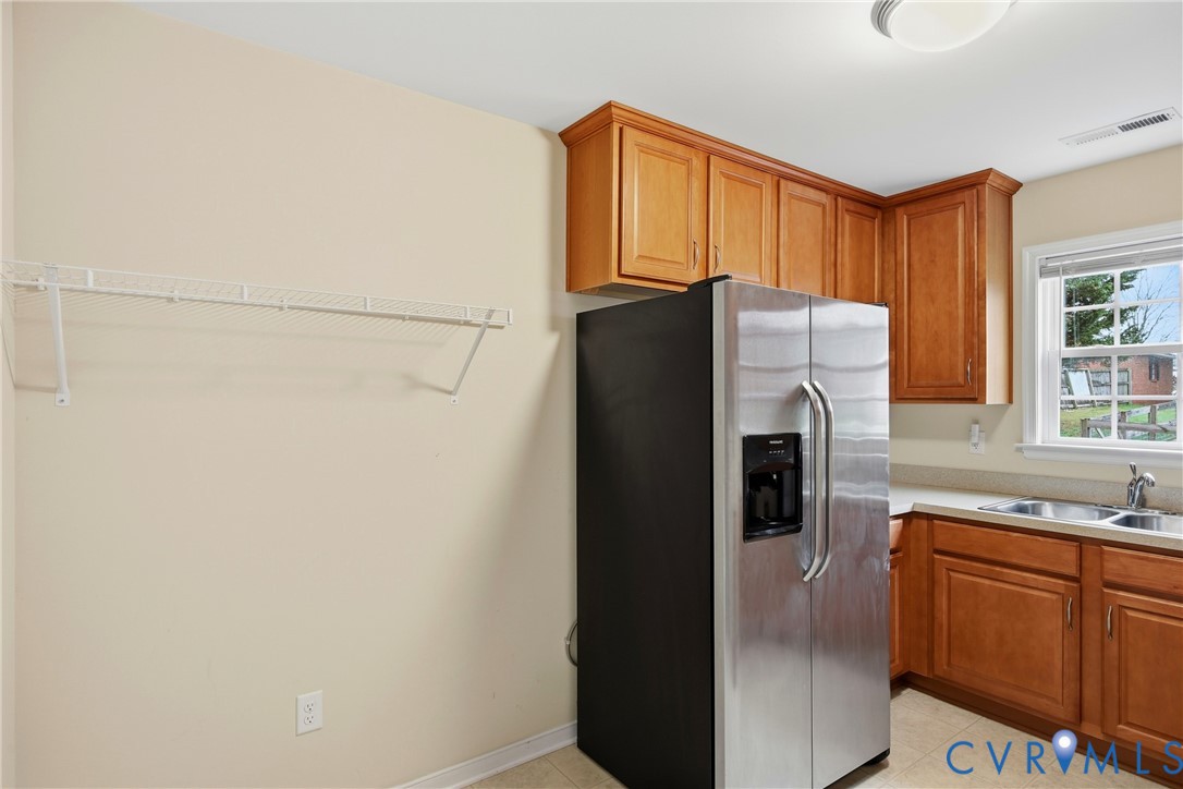 3007 Valleyfield Road Henrico, VA 23228 - Photo 16 of 38 a kitchen with stainless steel appliances a refrigerator and a sink