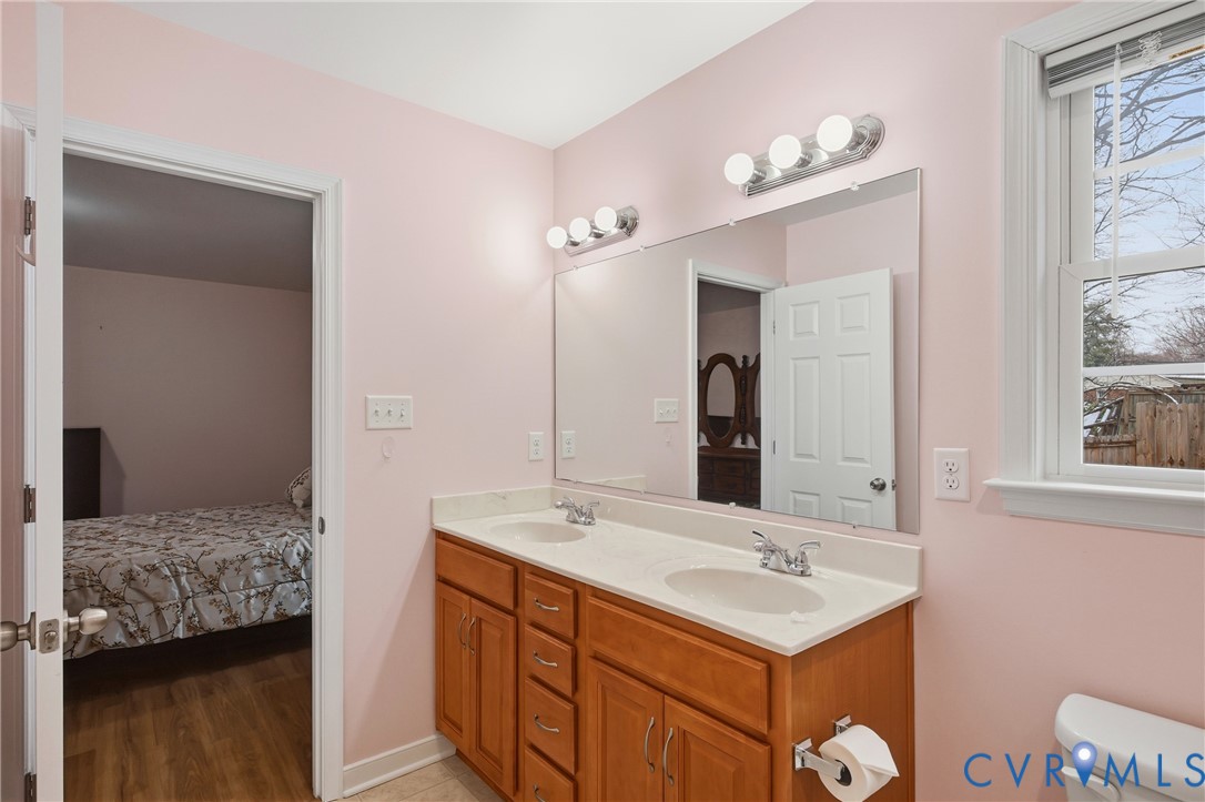 3007 Valleyfield Road Henrico, VA 23228 - Photo 20 of 38 a bathroom with a sink and a mirror