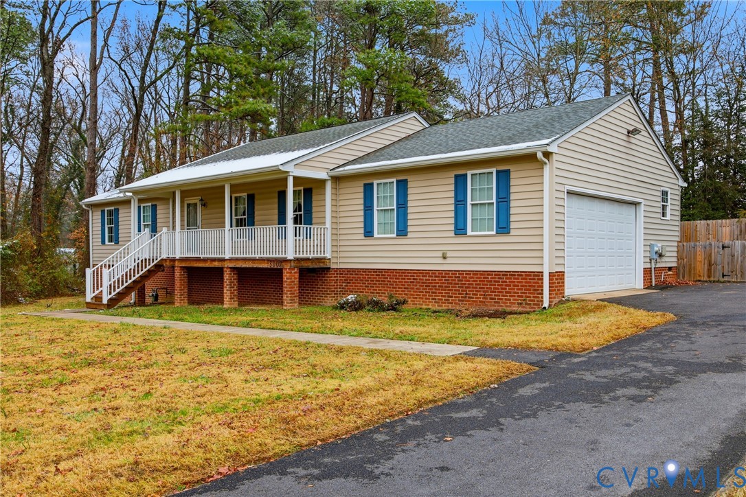 3007 Valleyfield Road Henrico, VA 23228 - Photo 2 of 38 a view of a house with backyard and trees