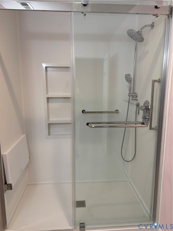 3007 Valleyfield Road Henrico, VA 23228 - Photo 22 of 38 a bathroom with a glass shower door