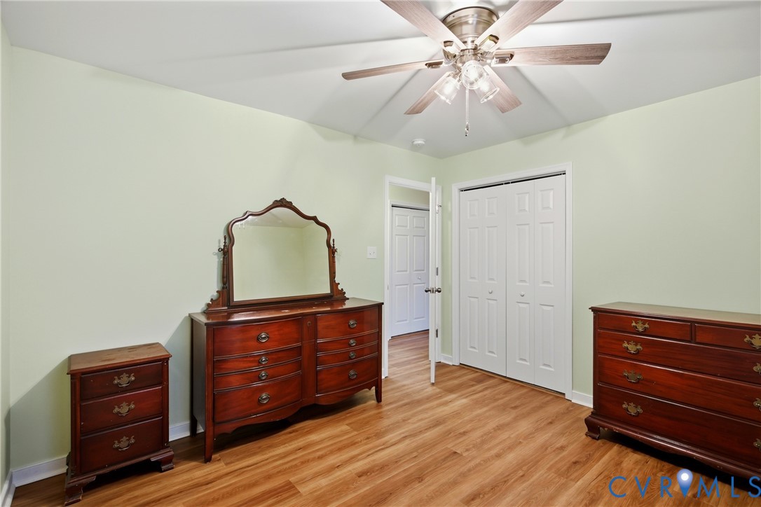 3007 Valleyfield Road Henrico, VA 23228 - Photo 28 of 38 a room with a dresser and a ceiling fan