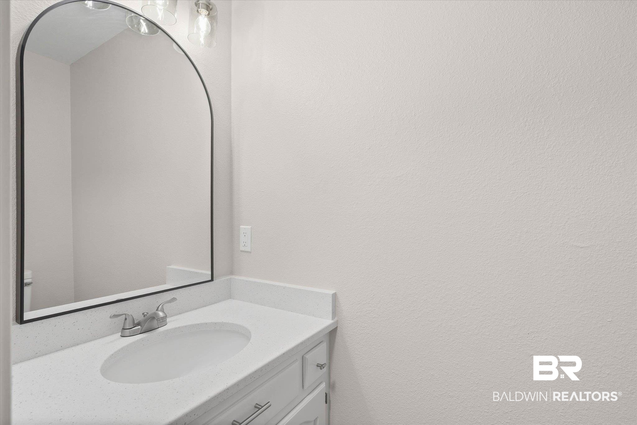 106 Melanie Loop Daphne, AL 36526 - Photo 29 of 45 Bathroom featuring vanity and a textured wall