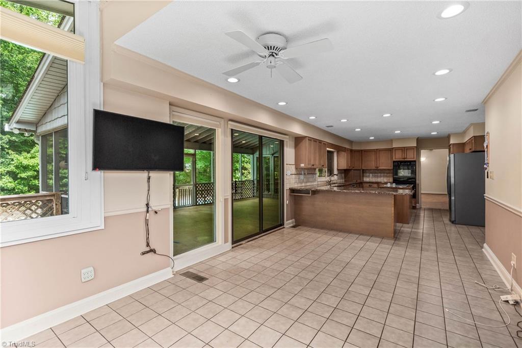 4200 Clinard Road Clemmons, NC 27012 - Photo 18 of 49 Sunroom looking into kitchen