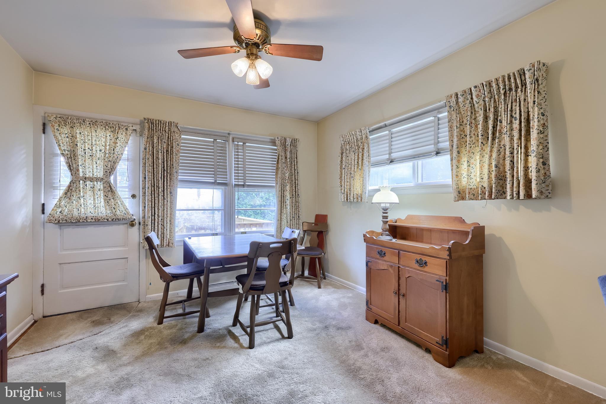 136 Springhouse Road Lancaster, PA 17603 - Photo 12 of 30 a view of a dining room with furniture and chandelier
