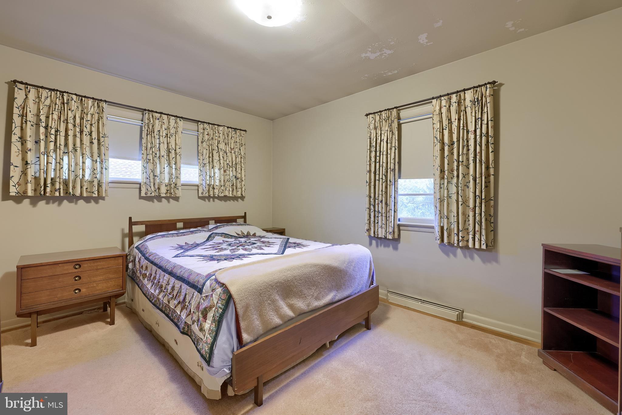 136 Springhouse Road Lancaster, PA 17603 - Photo 16 of 30 a bedroom with a bed and window