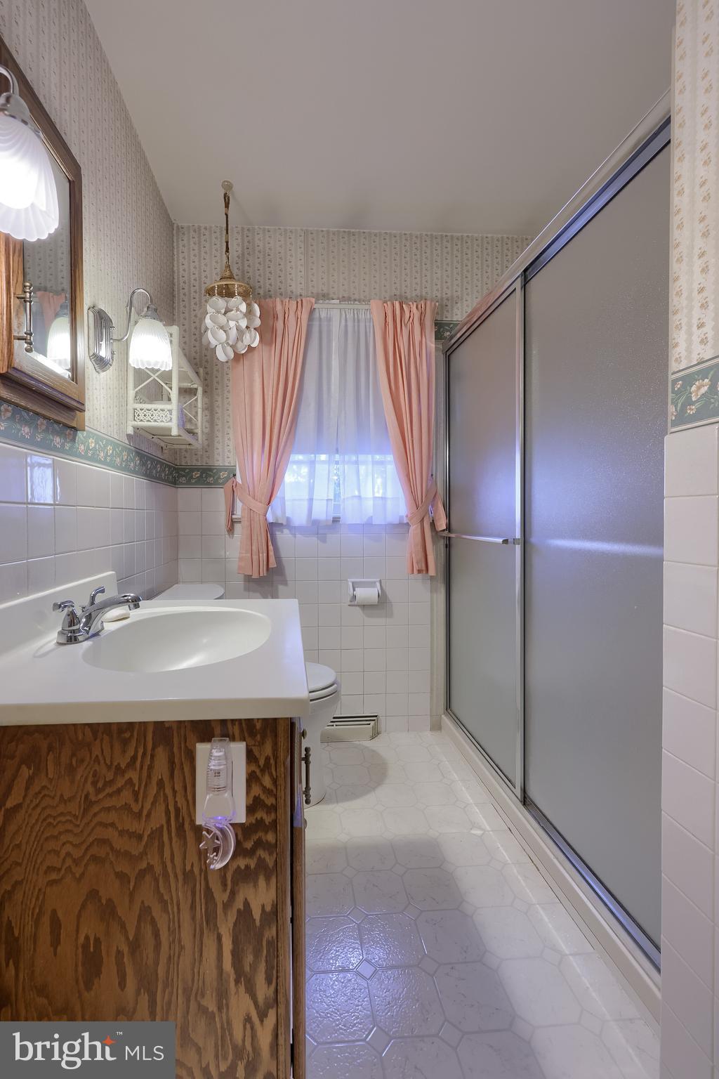 136 Springhouse Road Lancaster, PA 17603 - Photo 18 of 30 a bathroom with a sink and a mirror