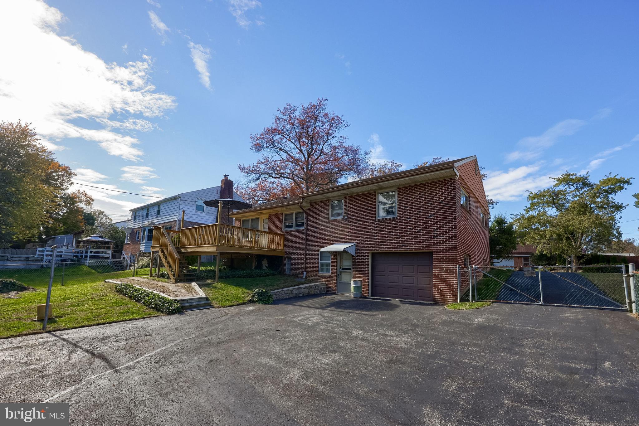 136 Springhouse Road Lancaster, PA 17603 - Photo 27 of 30 a view of a house with a yard and a fire pit