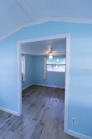 a view of an empty room and window