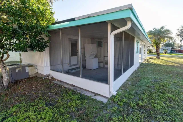 a view of a back yard of the house