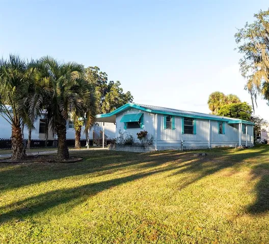 a front view of a house with swimming pool