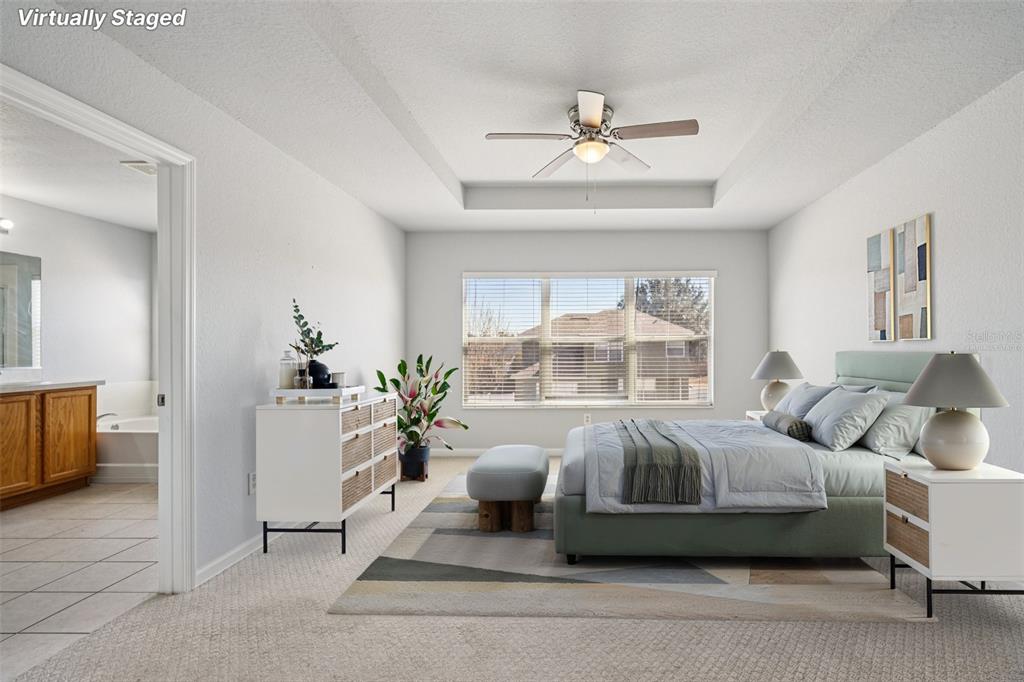 4127 Southwest 51st Court Ocala, FL 34474 - Photo 17 of 32 a living room with furniture and a large window