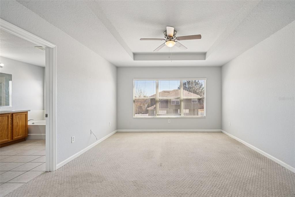 4127 Southwest 51st Court Ocala, FL 34474 - Photo 18 of 32 a view of an empty room with a window