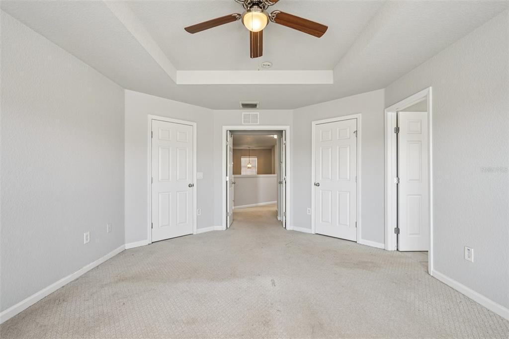 4127 Southwest 51st Court Ocala, FL 34474 - Photo 19 of 32 a view of an empty room and chandelier fan