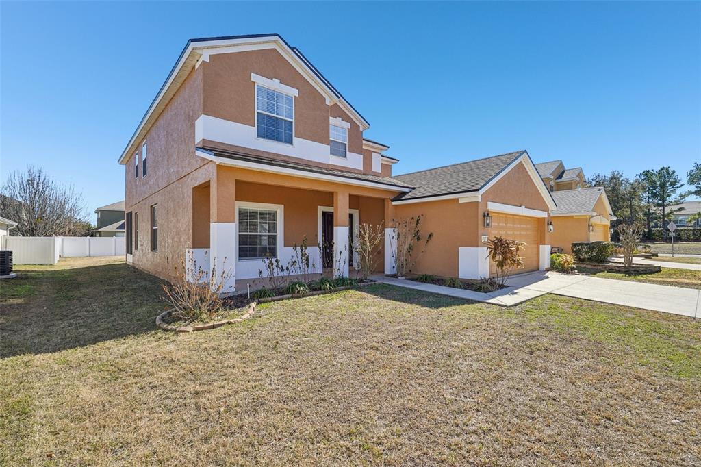 4127 Southwest 51st Court Ocala, FL 34474 - Photo 2 of 32 a view of a house with a yard