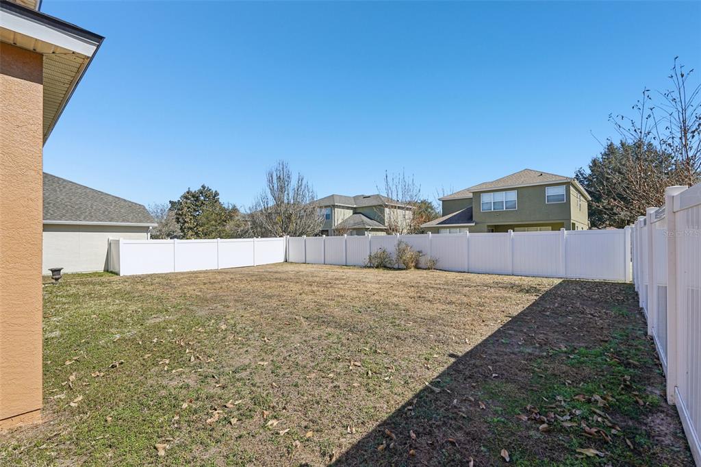 4127 Southwest 51st Court Ocala, FL 34474 - Photo 31 of 32 a view of a backyard