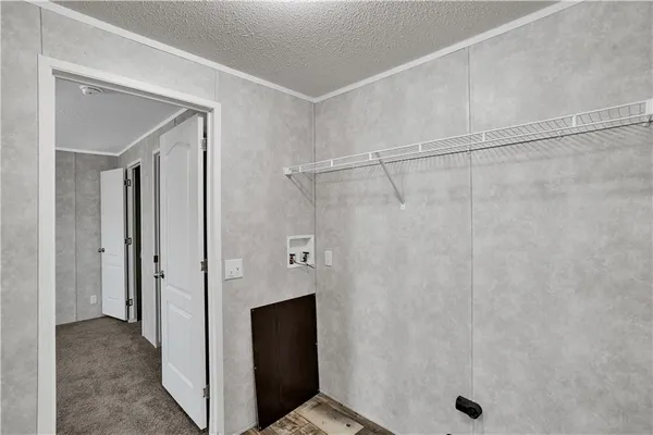 a view of a bathroom with a shower and a sink