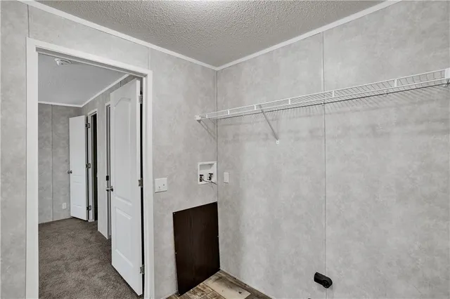 a view of a bathroom with a shower and a sink