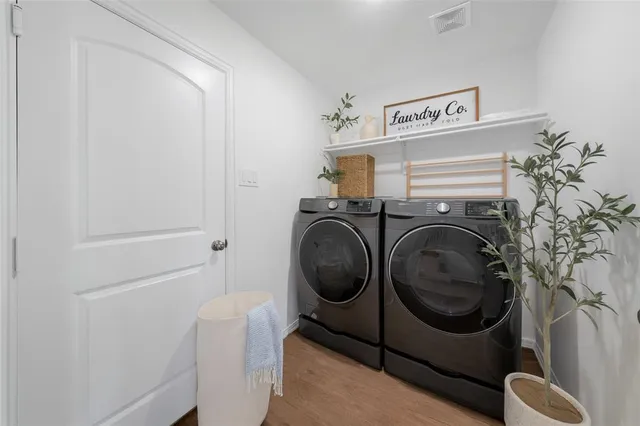 a utility room with dryer and washer