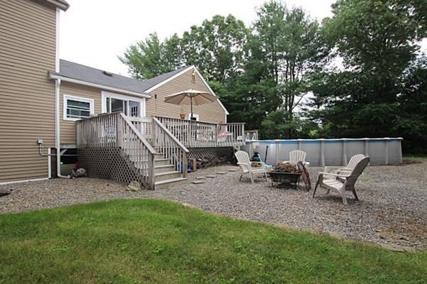40 Old Farm Road North Attleboro, MA 02760 - Photo 11 of 36 a view of a house with a yard and sitting area
