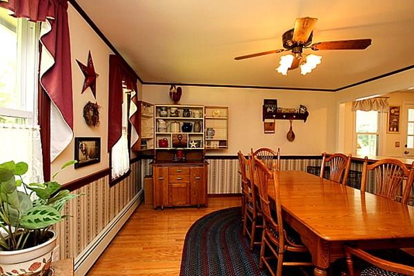 40 Old Farm Road North Attleboro, MA 02760 - Photo 17 of 36 a dining room with furniture and wooden floor