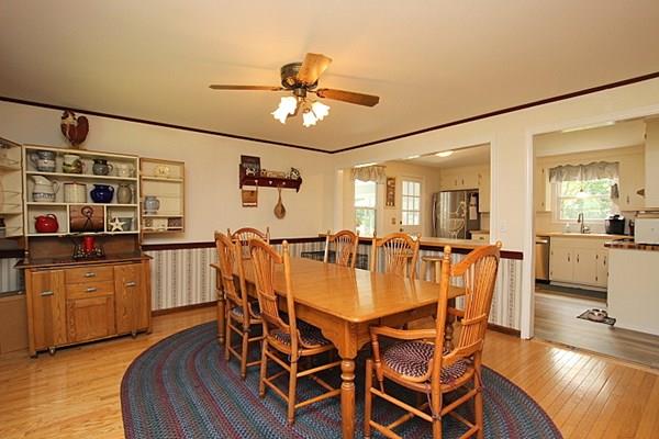 40 Old Farm Road North Attleboro, MA 02760 - Photo 18 of 36 a view of a dining room with furniture and wooden floor