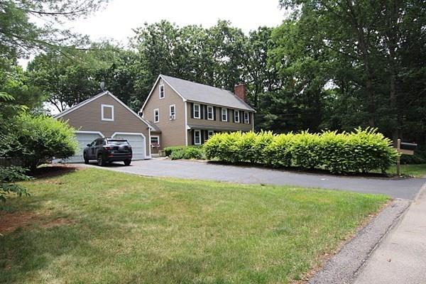 40 Old Farm Road North Attleboro, MA 02760 - Photo 3 of 36 a front view of a house with a yard and shrubs