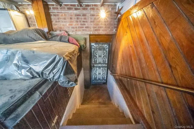 a bed room with a bed and a window