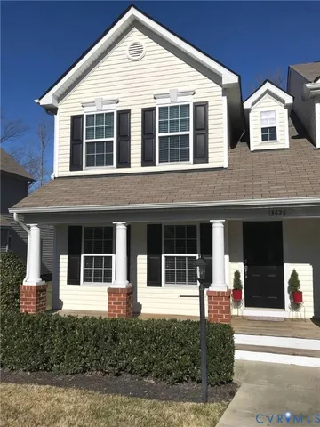 a front view of a house with windows