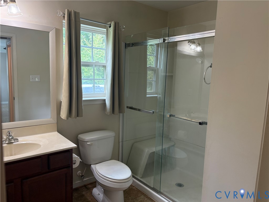 13628 Baycraft Terrace Midlothian, VA 23112 - Photo 22 of 24 a bathroom with a shower a toilet and sink