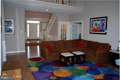 9129 Travener Circle Frederick, MD 21704 - Photo 11 of 28 a living room with furniture and a rug