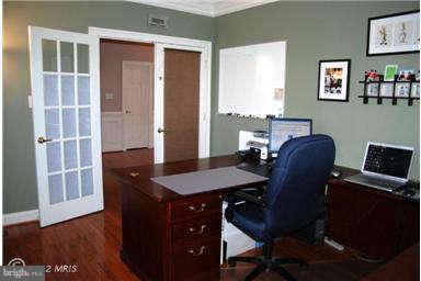 9129 Travener Circle Frederick, MD 21704 - Photo 13 of 28 a view of a workspace with furniture and a window