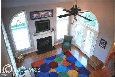 9129 Travener Circle Frederick, MD 21704 - Photo 14 of 28 a living room with furniture fireplace and flat screen tv