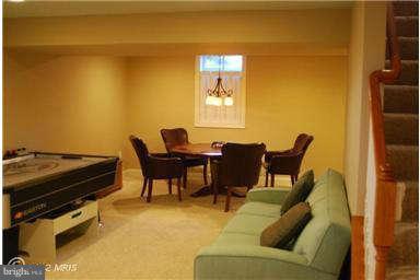 9129 Travener Circle Frederick, MD 21704 - Photo 22 of 28 a living room with furniture and a air conditioner vent