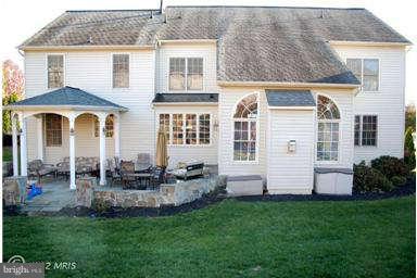 9129 Travener Circle Frederick, MD 21704 - Photo 26 of 28 front view of a house with a yard