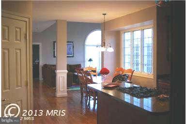 9129 Travener Circle Frederick, MD 21704 - Photo 6 of 28 a outdoor space with lots of furniture and wooden floor